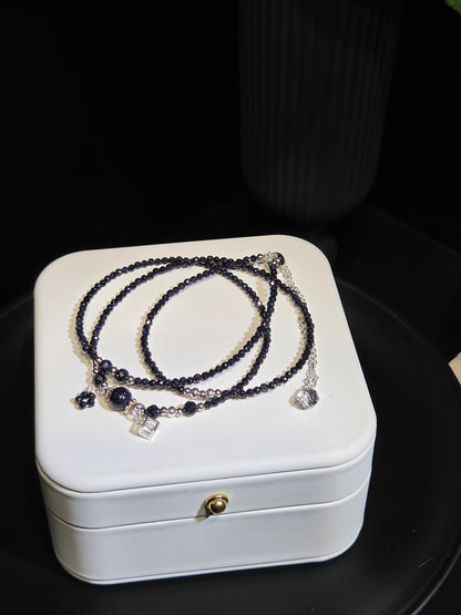 Midnight Blue Sandstone Beaded Bracelet in a white jewelry box