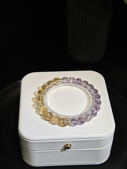 Harmonic Amethyst and Citrine Beaded Bracelet in a white jewelry box