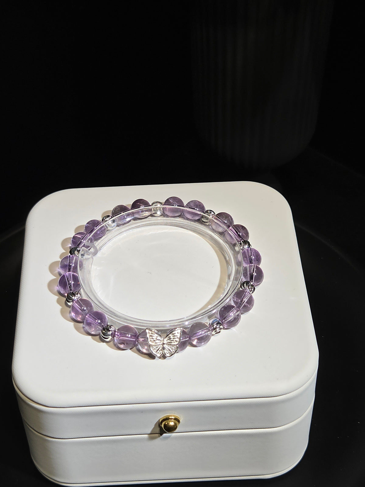 Amethyst Beaded Bracelet with Silver Butterfly Charm in a white jewelry box