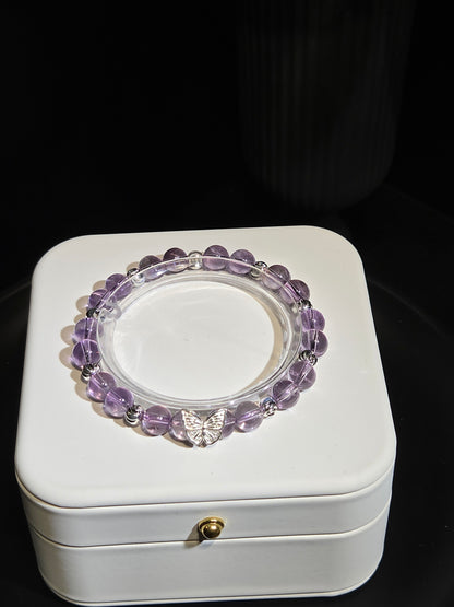 Amethyst Beaded Bracelet with Silver Butterfly Charm in a white jewelry box
