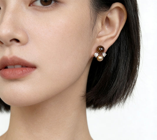 Light luxury smoky quartz and golden pearl cluster stud earrings worn by model