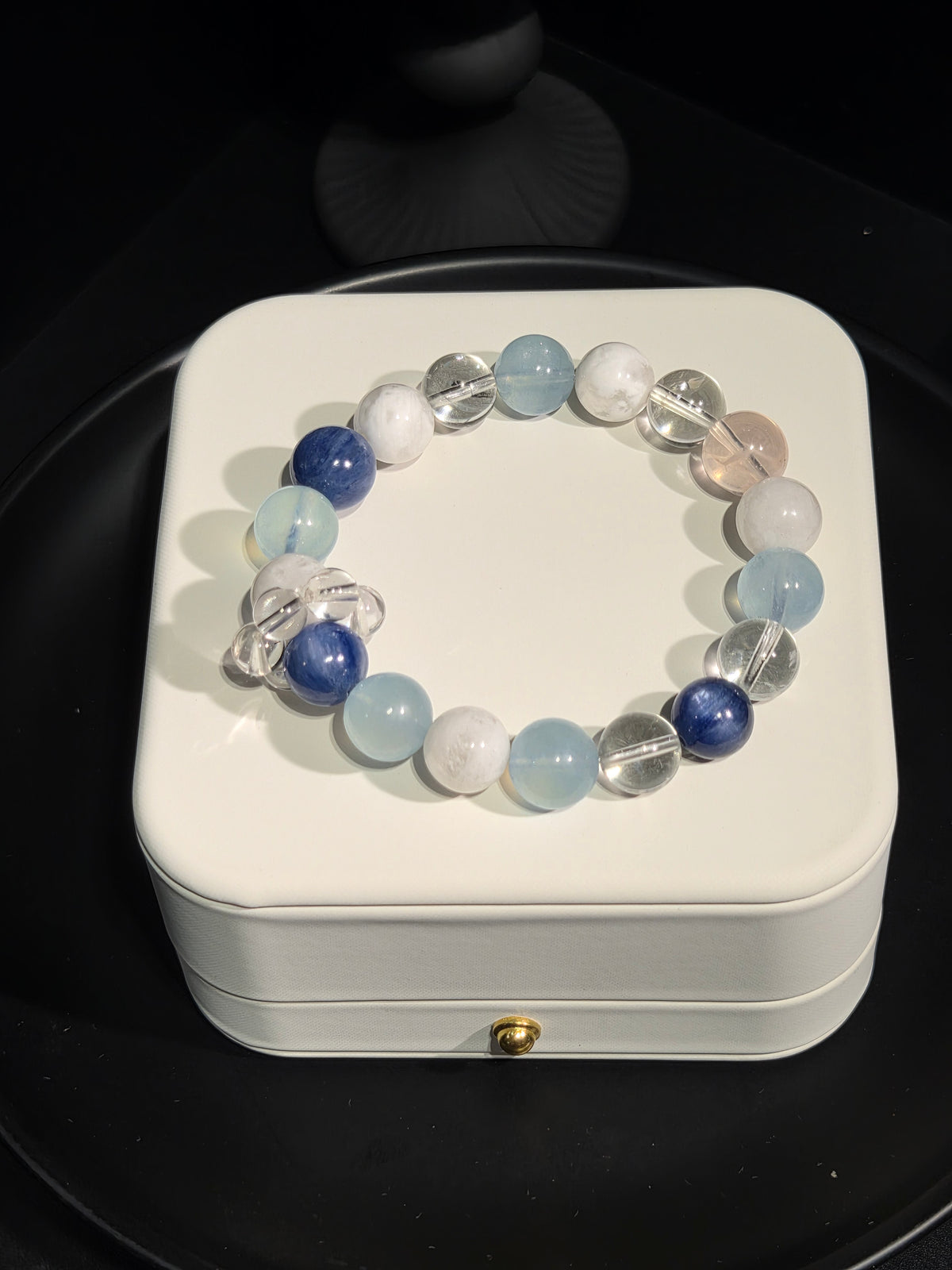 Light luxury kyanite and aquamarine beaded crystal bracelet on display stand