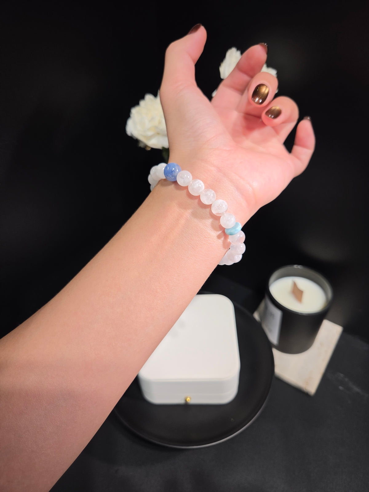 Light luxury white moonstone and aquamarine beaded crystal bracelet on wrist